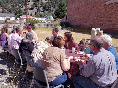 Every Sunday after worship the Basin Presbyterian New Worshipping Community in Montana meets for a shared, home-cooked meal with visitors that are in town.  This is one of their summer meals held outdoors in the neighboring park. Photo by NWC Evangelist/Pastor Ok-Kee Kim.