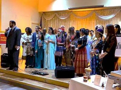 2020 recipients Fresno Interdenominational Refugee Ministries staff in cultural attire, photo provided.