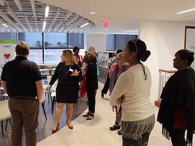 Susan Reimann, executive vice president and chief operating officer of the Board of Pensions leads COGA members on tour of BOP offices.