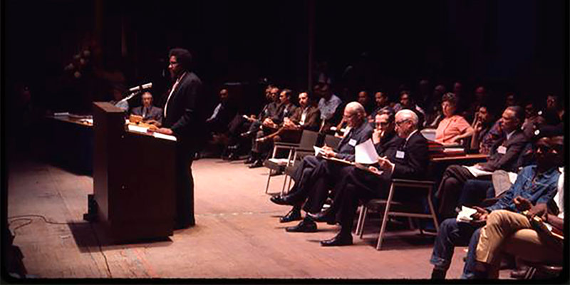 James Forman, spokesman for National Black Economic Development Conference, addresses the General Assembly.