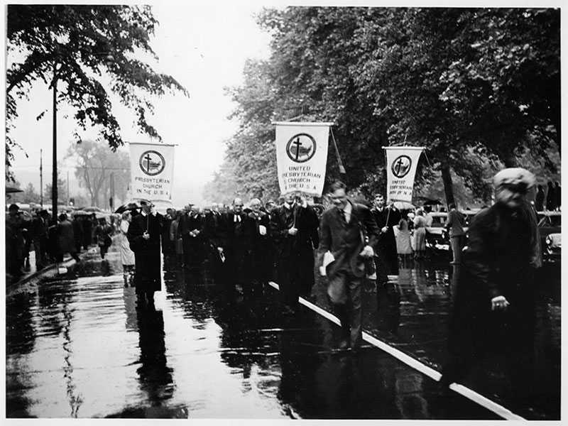 Procession with the three denominational banners on Bigelow Boulevard in Pittsburgh.