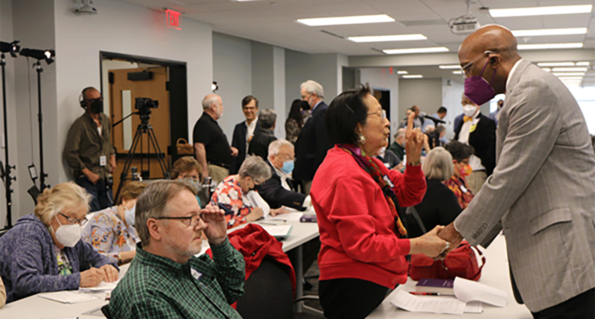 The Rev. Dr. J. Herbert Nelson, II, Stated Clerk of the General Assembly of the PC(USA), greets presbyters during Mid-Kentucky Presbytery meeting in the new conference room at the Presbyterian Center, June 2022, photo via Randy Hobson.