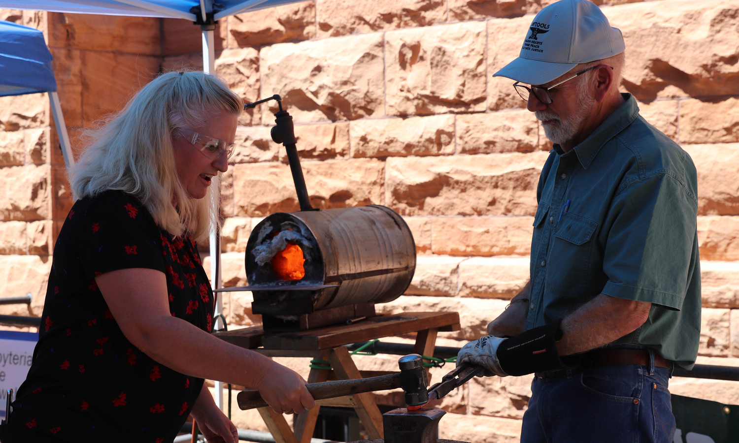 “Guns to Garden” event where guns are transfigured into garden tools.