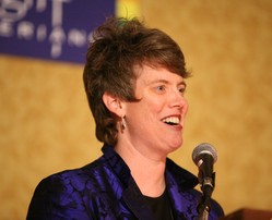 Photo of a woman at a podium