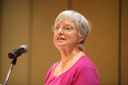 Photo of a woman at a podium