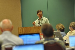 A man at a podium speaking