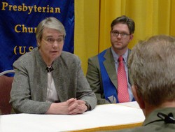 Photo of a man and woman seated at a table