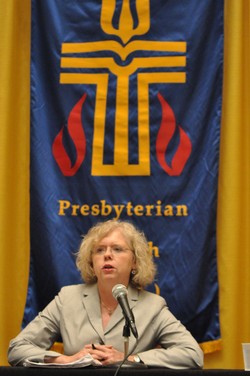 Photo of a woman at a podium