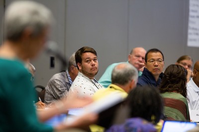 Members of the [12] Middle East Issues Committee hear from an overture advocate at the 223rd General Assembly on Monday, June 18.