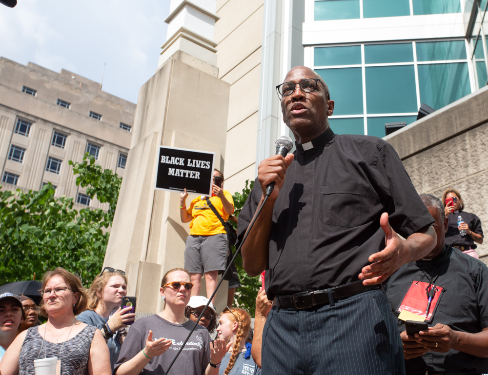 Rev. J. Herbert Nelson, II, Stated Clerk of the General Assembly, speaks at the City Justice Center in St. Louis, the destination for the one-mile "bail-out" march. (Photo by: Michael Whitman) 