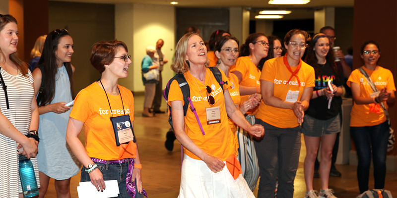 Presbyterian Peace Fellowship and Fossil Free PCUSA representatives opening of the 223rd General Assembly on Friday encouraging corporate divestment from fossil fuels. (Photo by Danny Bolin)