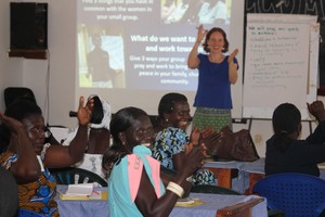 Nancy facilitating discussion with women leaders about problems in their communities.