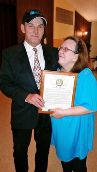 Larry receiving the Molina Healthcare Volunteers of the Year Award, with his wife Nancy at his side. Formerly homeless, and Divine Intervention guest, Larry began the Larry Under The Bridge ministry serving local campers.