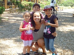 Abby Ratner, a member of Ghost Ranch’s college staff, with three summer youth program participants.