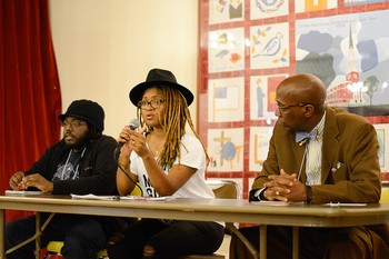 Aaron Goggans and Erika Totten, organizers for the Black Lives Matter movement in Washington, D.C. join the Rev. Dr. J. Herbert Nelson during a lunchtime plenary at CPJ Day.