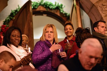 Members of North Avenue Presbyterian Church in Atlanta gather outside the church for a candlelight vigil with Street GRACE, a faith-based nonprofit fighting human trafficking.