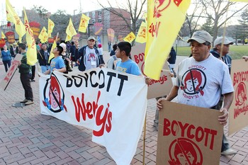 Supporters for the Coalition of Immokalee Workers take to the U of L campus to call for a boycott against Wendy’s restaurants.