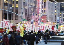 More than 500 farmworkers and supporters of the Coalition of Immokalee Workers demonstrate last week outside the offices of Nelson Pelz, the chairman of Wendy's Board of Directors.