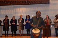 Staff hold candlelight vigil.