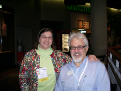 Beth Herrinton-Hodge and Mark Hinds, seated.