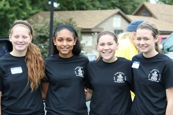 Jessica Collins, second from left, founded A Place to Sleep after learning some children in her county were without beds.