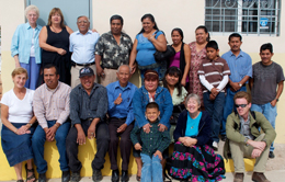 A group of people in two rows for a photo.