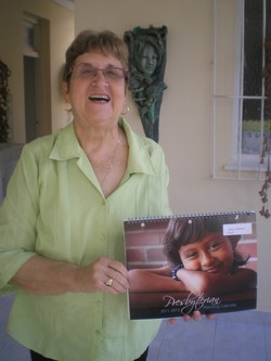 A woman holding a calendar