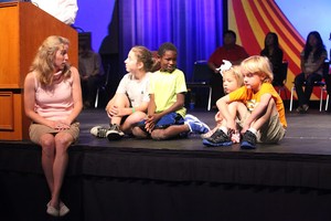 Meg and kids at worship