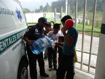 Firefighters delivering water