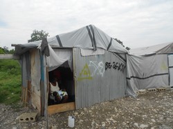 A women in her tent home.