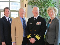Group photo of four church leaders in the chapel