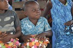 Congo kid with pillow