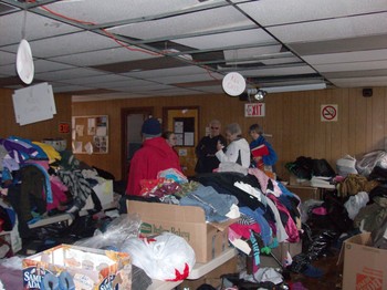 Boxes and boxes of clothing and other emergency supplies fill the fellowship hall of Christ By the Sea Presbyterian Church in Breezy Point.