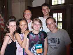 A group of young adults standing together for a photo.