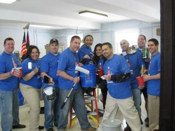 Volunteers with paint