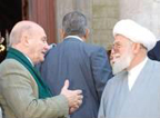 Two older gentlemen talking to each other.