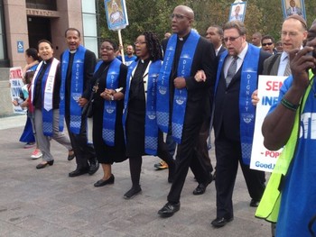 Left to right, Rev. Sung Yeon Choimorrow, Rev. Michael Livingston, Rev. Andrea Alexander, Rev. Sekinah Hamlin, Rev. Dr. J. Herbert Nelson, Rev. Dr. Ken Brooker Langston, Rabbi Jason Kimelman-Block, marched asking the Pope to acknowledge the plight of striking low-wage federal contract workers. 