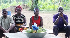 A community meeting with PDA-supported West Africa Initiative representatives in Bunchanan, Liberia.