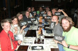 Mueller and her campus ministry colleagues dine in Guatemala, 2009. Mueller is second from left.