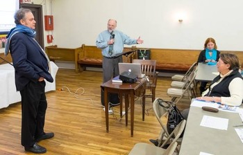 Mark Koenig, director of the Presbyterian Ministry at the United Nations, introduces John Solecki of UNHRC, the UN Refugee Agency.