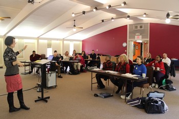 Sally Wright, associate for the Special Offerings Ambassador Program, addresses the 2016 ambassadors at Stony Point.