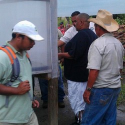 SDOP National Committee members visit with representatives  of the Trio Farmers and Seine Bight Village projects in Belize.  