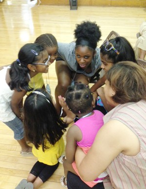 Old Bergen Church plans to open an afterschool program in their neighborhood this fall and hire a youth director. Here kids, teens and adults enjoy a moment of play at Vacation Bible School.