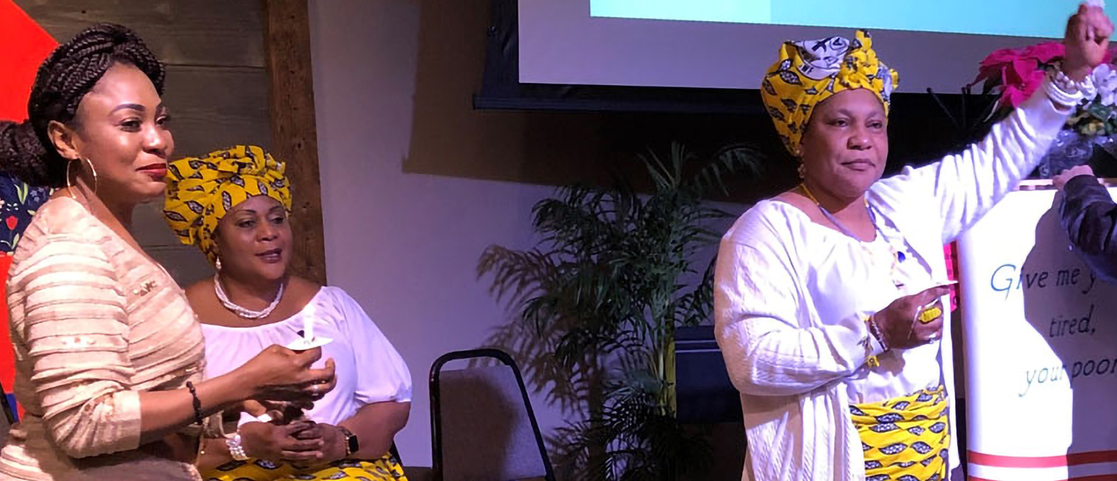 Gladys Mbonifor (right) participates in worship with her sisters at Spirit of Life Presbyterian Church in Apple Valley, Minnesota—Amanda Craft.