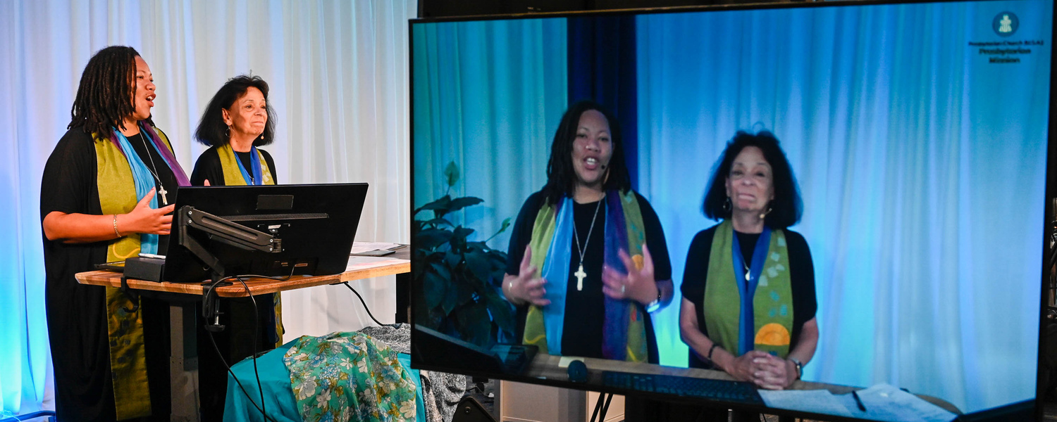 The Rev. Shavon Starling-Louis and The Rev. Ruth Santana Grace moderate the fourth plenary of the 225th General Assembly of the Presbyterian Church (U.S.A.) on July 5, 2022, at the Presbyterian Center in Louisville, Kentucky. (Photo by Rich Copley)