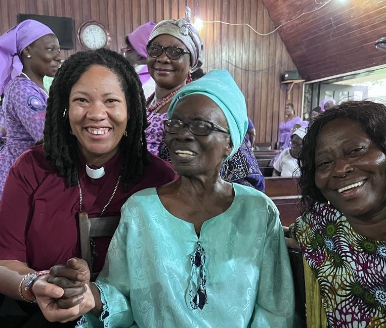 Shavon Starling-Louis (left) holding hands with Mercy Oduyoye (center), Ghana, Summer 2023. Photo courtesy of Shavon Starling-Louis.