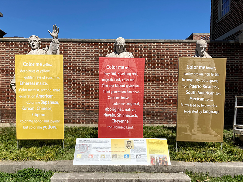 The outdoor exhibit includes additional information by the statues. Photo by Kristen Gaydos.