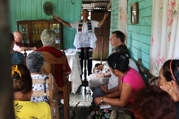 Ary Fernandez, moderator of the Presbyterian Reformed Church in Cuba, leads worship at the Presbyterian Mission at Marcane.