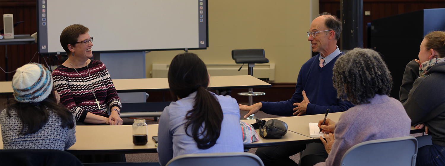 : Rev. Cindy Kohlmann talks with students and the Rev. Scott Clark, chaplain at San Francisco Theological Seminary last week. Photo by Rick Jones