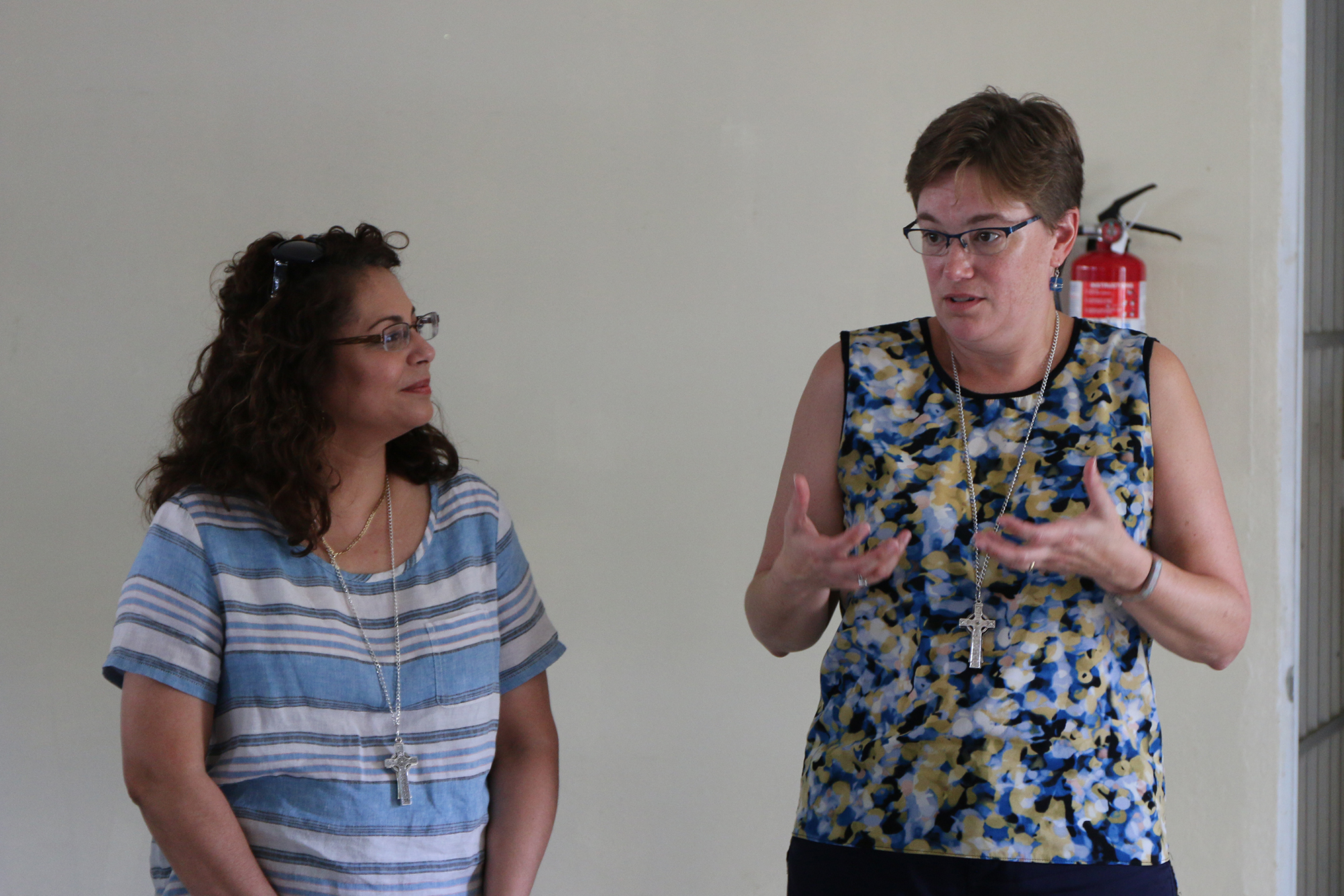 Co-Moderators of the 223rd General Assembly (2018), Elder Vilmarie Cintrón-Olivieri and Rev. Cindy Kohlmann speak to members of the Vega Alta Presbyterian Church. Photo by Rick Jones